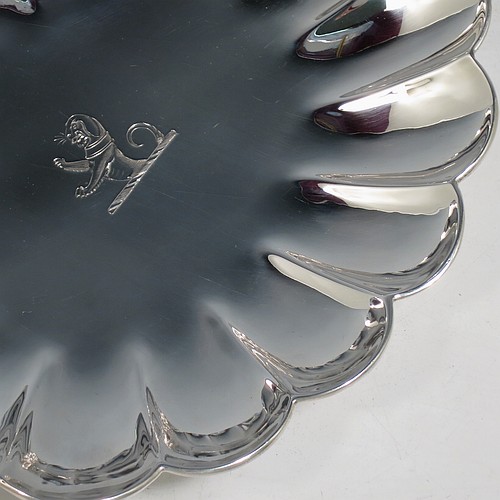 A very pretty Antique Victorian Sterling Silver strawberry dish, having an oval lobed body, with cast and hand-chased handles in the shape of roses, and sitting on a collet foot. Made by William Robert Smily of London in 1853. The dimensions of this fine hand-made antique strawberry table dish are length 24 cms (9.5 inches), width 19 cms ((7.5 inches), height 4 cms (1.5 inches), and it weighs approx. 316g (10.2 troy ounces).