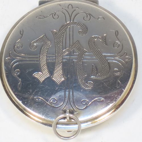 A large and very handsome Sterling Silver Pyx box, having a plain round body, a hinged lid with a hand-engraved Christogram over a cross, a gold-gilt interior, and a clasp with ring handle. Made by Burns, Oats, and Washbourne of London in 1930. The dimensions of this fine hand-made silver Pyx box are diameter 5 cms (2 inches), depth 1.5 cms (0.5 inches), and it weighs approx. 33g (1 troy ounce).
