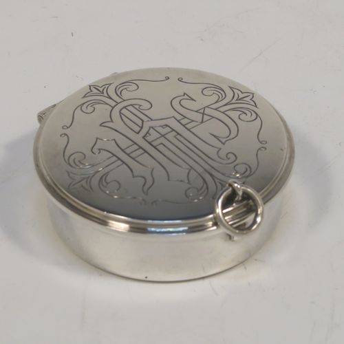 A large and very handsome Sterling Silver Pyx box, having a plain round body, a hinged lid with a hand-engraved Christogram over a cross, a gold-gilt interior, and a clasp with ring handle. This elegant sterling silver Pyx box was made by A. R. Mowbray of London in 1960. The dimensions of this fine hand-made silver Pyx box are diameter 4.5 cms (1.75 inches), depth 2 cms (0.8 inches), and it weighs approx. 33g (1 troy ounce).   