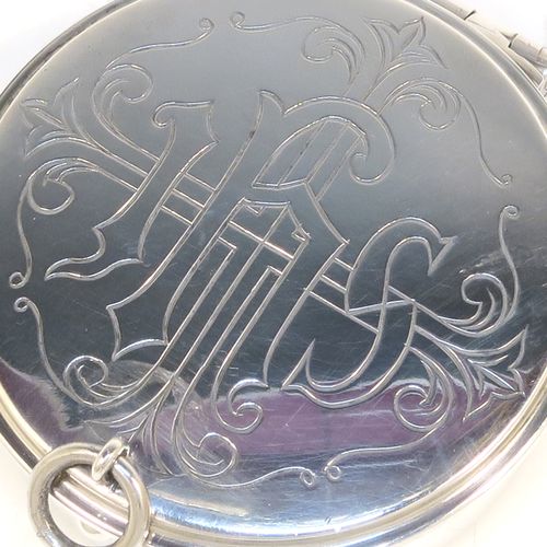 A large and very handsome Sterling Silver Pyx box, having a plain round body, a hinged lid with a hand-engraved Christogram over a cross, a gold-gilt interior, and a clasp with ring handle. This elegant sterling silver Pyx box was made by A. R. Mowbray of London in 1960. The dimensions of this fine hand-made silver Pyx box are diameter 4.5 cms (1.75 inches), depth 2 cms (0.8 inches), and it weighs approx. 33g (1 troy ounce).