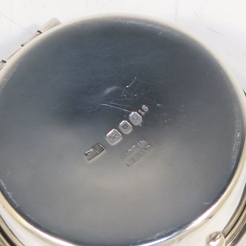 A large and very handsome Sterling Silver Pyx box, having a plain round body, a hinged lid with a hand-engraved Christogram over a cross, a gold-gilt interior, and a clasp with ring handle. This elegant sterling silver Pyx box was made by A. R. Mowbray of London in 1960. The dimensions of this fine hand-made silver Pyx box are diameter 4.5 cms (1.75 inches), depth 2 cms (0.8 inches), and it weighs approx. 33g (1 troy ounce).