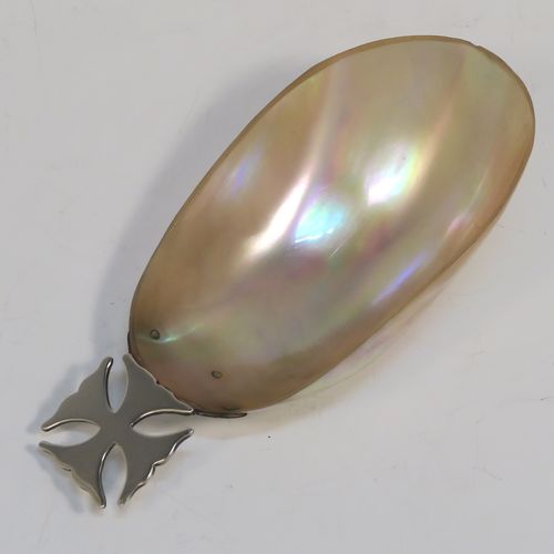 A rare and very pretty Antique Edwardian Sterling Silver and Mother-of-Pearl Anointing or Baptismal holy water Shell, having a silver handle pinned to a shell scoop, all in original very good condition with no damage to the mother-of-pearl. This beautiful baptism or anointing shell was made in London in 1910. The dimensions of this fine hand-made Baptism or Anointing Shell are length 12 cms (4.75 inches), and width 5.5 cms (2.25 inches).