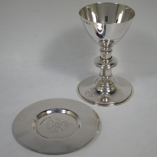 A handsome Antique Victorian Sterling Silver altar chalice and paten, having a plain round tapering cup, a middle plain round stepped baluster, sitting on a round stepped pedestal foot, and a matching plain round paten. Made by J. Sherwood and Sons of Birmingham in 1868. The dimensions of this fine hand-made antique silver chalice and paten are height of chalice 12.5 cms (5 inches), diameter of paten 11.5 cms (4.5 inches), and with a total weight of approx. 252g (8 troy ounces).
