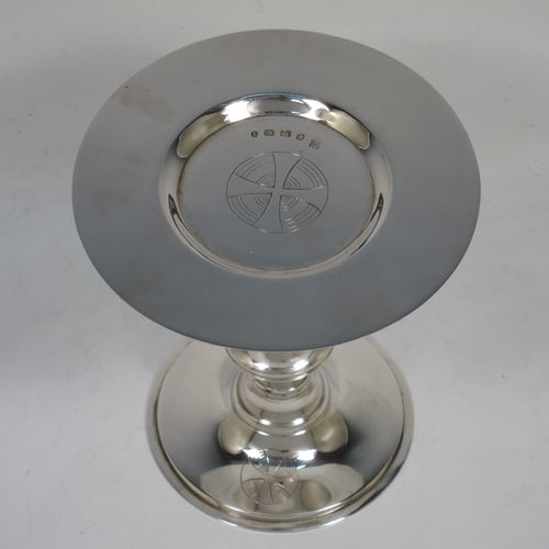 A handsome Antique Victorian Sterling Silver altar chalice and paten, having a plain round tapering cup, a middle plain round stepped baluster, sitting on a round stepped pedestal foot, and a matching plain round paten. Made by J. Sherwood and Sons of Birmingham in 1868. The dimensions of this fine hand-made antique silver chalice and paten are height of chalice 12.5 cms (5 inches), diameter of paten 11.5 cms (4.5 inches), and with a total weight of approx. 252g (8 troy ounces).