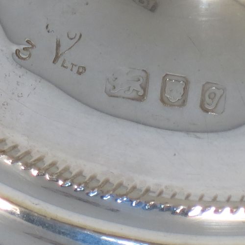 A handsome Sterling Silver Ciborium, having a plain round body with applied rope-twist borders and a gold-gilt interior, sitting on a matching pedestal foot with central baluster, and a lift-off lid with cruciform finial. Made by Vanpoulles Ltd. of London in 1962. The dimensions of this fine hand-made silver ciborium are height 19 cms (7.5 inches), diameter of cup 8.5 cms (3.3 inches), and the cup weighs approx. 264g (8.5 troy ounces).