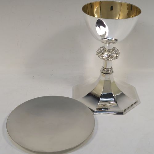 A very handsome Sterling Silver altar chalice and paten, having a round tapering cup with a gold-gilt interior, a middle baluster with applied jewel and band decoration, and a spreading hexagonal pedestal foot, together with an original plain round paten. This elegant silver chalice and paten was made by William F. Knight Ltd., of London in 1953. The dimensions of this fine hand-made silver chalice and paten are height 19 cms (7.5 inches), diameter of paten 15.5 cms (6 inches), and it weighs approx. 705g (22.5 troy ounces).