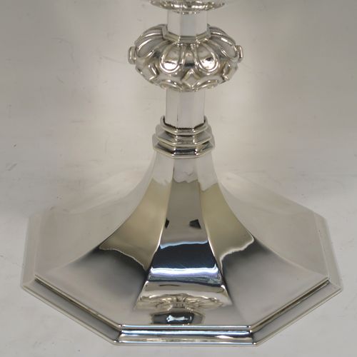 A very handsome Sterling Silver altar chalice and paten, having a round tapering cup with a gold-gilt interior, a middle baluster with applied jewel and band decoration, and a spreading hexagonal pedestal foot, together with an original plain round paten. This elegant silver chalice and paten was made by William F. Knight Ltd., of London in 1953. The dimensions of this fine hand-made silver chalice and paten are height 19 cms (7.5 inches), diameter of paten 15.5 cms (6 inches), and it weighs approx. 705g (22.5 troy ounces).