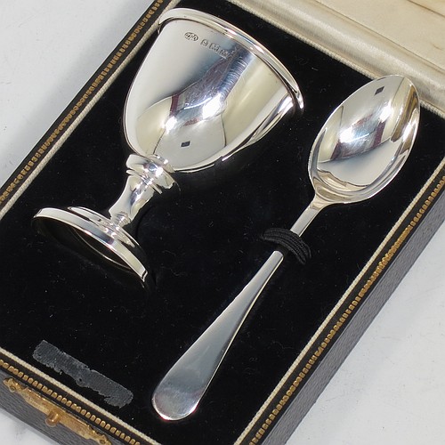 A handsome Sterling Silver egg cup and spoon, having a plain round egg cup with a gold-gilt interior, and a plain Old English pattern spoon. All fitted in their original cream satin and black velvet-lined presentation box. Made by Arthur Price of Birmingham in 1936. The dimensions of this fine hand-made silver egg cup and spoon are length of spoon 11 cms (4.3 inches), height of egg cup 6.5 cms (2.5 inches), and the total weight is approx. 28g (0.9 troy ounce).   