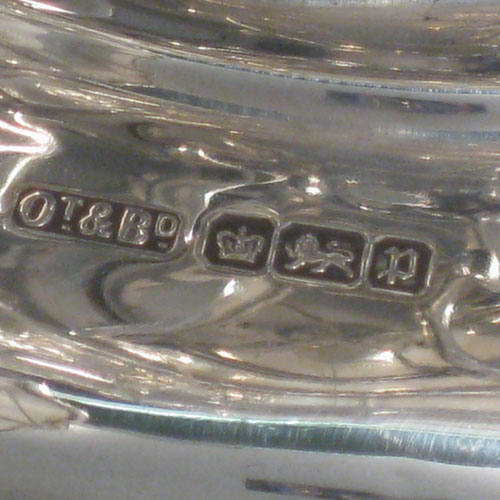 Antique Edwardian sterling silver table epergne center-piece, having an Art Nouveau style, with one central large dish and two smaller dishes resting on side arms, and all sitting on a pedestal base with four pierced feet. Made by Olivant and Botsford of Sheffield in 1907. Height 30 cms (11.75 inches), width 50 cms (19.75 inches), depth 26 cms (10.25 inches). Total weight approx. 2,058 (66.4 troy ounces).