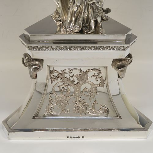 A beautiful and impressive Scottish Antique Victorian Sterling Silver epergne centre-piece, having a top bowl with hand-chased floral, scroll and figural decoration, above a central area consisting of three separate cast caryatid female figures, all sitting on a triangular plinth with tapering sides and applied figural and scroll motifs. This wonderful antique silver centrepiece epergne was made by Marshall and Sons of Edinburgh, Scotland, in 1837. The dimensions of this fine hand-made silver centre-piece are height 47.5 cms (18.75 cms), diameter of bowl 28 cms (11 inches), and it weighs approx. 3,680g (118.7 troy ounces).