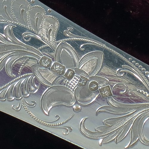 An Antique Victorian Sterling Silver fish serving knife and fork set, having hand-carved bone handles, with hand-engraved blade and tines with floral decoration, all in their original maroon satin and velvet-lined presentation box. Made by Robert Fead Mosley of Sheffield in 1894. The dimensions of this fine hand-made antique silver and bone-handled fish serving set are length of knife 32 cms (12.5 inches), and length of fork 24 cms (9.5 inches).   
