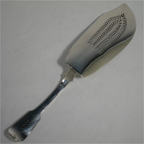 An Antique Georgian Sterling Silver fish server slice, in the plain Fiddle pattern, having a hand-pierced asymmetrical and curved blade, and a hand-engraved reeded border. Made by William Knight of London in 1825. The dimensions of this fine hand-made antique silver fish serving slice are length 30 cms (11.75 inches), and it weighs approx. 154g (5 troy ounces).