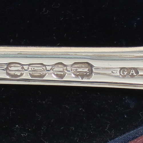 An Antique Victorian Sterling Silver pair of fish serving knife and fork set, having solid handles in the double-struck Victorian Bead pattern, with reeded handles, and hand-pierced blade and tines with floral decoration, all in their original blue velvet and cream satin lined presentation box. Made by George Adams of London in 1862. The dimensions of this fine hand-made antique silver fish serving set are length of knife 31 cms (12.75 inches), length of fork 25.5 cms (10 inches), and they weigh a total of 320g (10.3 troy ounces).   