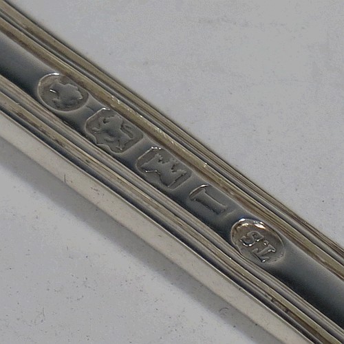 A very pretty Antique Victorian Sterling Silver fish serving knife and fork set, having handles in the double-struck Queens pattern, hand-pierced and hand-engraved with floral and leaf decoration, the blade with a cartouche engraved with a scene of a sea fishing vessel. Made by Thomas Hart Stone of Exeter in 1865. The dimensions of this fine hand-made antique silver fish serving set are length of knife 31 cms (12.25 inches), length of fork 25.5 cms (10 inches), and a total weight of 300g (9.7 troy ounces).