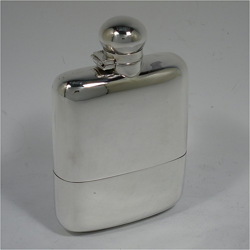 A very handsome Antique Victorian Sterling Silver whisky hip flask, having a plain shaped rectangular body with rounded shoulders, a bayonet-fit lid, and a pull-off cup with gold-gilt interior. Made by James Dixon and Sons of Sheffield in 1896. The dimensions of this fine hand-made antique silver whisky flask are length 12.5 cms (5 inches), width 8 cms (3.25 inches), depth 2.5 cms (1 inch), and it weighs approx. 209g (6.7 troy ounces).