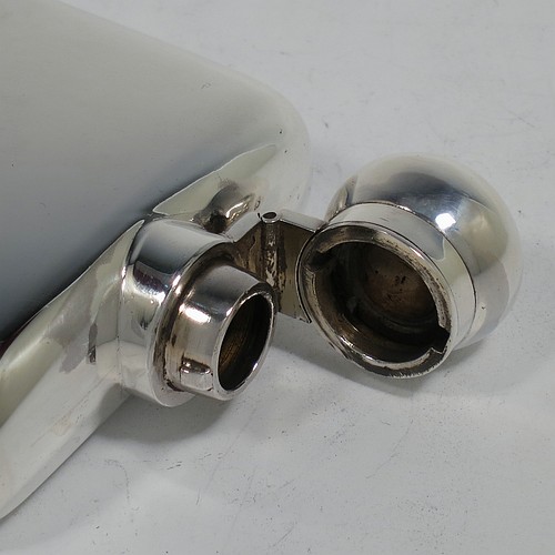 A very handsome Antique Victorian Sterling Silver whisky hip flask, having a plain shaped rectangular body with rounded shoulders, a bayonet-fit lid, and a pull-off cup with gold-gilt interior. Made by James Dixon and Sons of Sheffield in 1896. The dimensions of this fine hand-made antique silver whisky flask are length 12.5 cms (5 inches), width 8 cms (3.25 inches), depth 2.5 cms (1 inch), and it weighs approx. 209g (6.7 troy ounces).