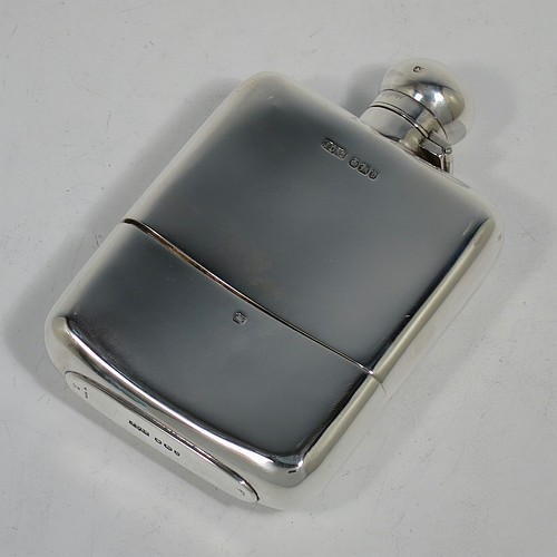 A very handsome Antique Victorian Sterling Silver whisky hip flask, having a plain shaped rectangular body with rounded shoulders, a bayonet-fit lid, and a pull-off cup with gold-gilt interior. Made by James Dixon and Sons of Sheffield in 1896. The dimensions of this fine hand-made antique silver whisky flask are length 12.5 cms (5 inches), width 8 cms (3.25 inches), depth 2.5 cms (1 inch), and it weighs approx. 209g (6.7 troy ounces).