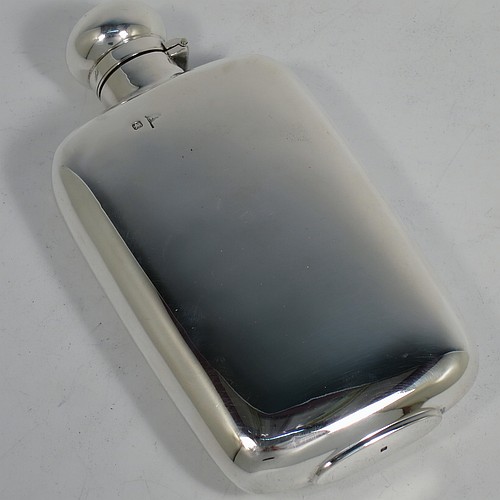 A very handsome Antique Victorian Sterling Silver whisky hip flask, having a plain shaped rectangular body with rounded shoulders, and a bayonet-fit lid. Made by Walker and Hall of Sheffield in 1896. The dimensions of this fine hand-made antique silver hip whisky flask are length 15 cms (6 inches), width 8 cms (3 inches), depth 3 cms (1.25 inch), and it weighs approx. 189g (6 troy ounces).