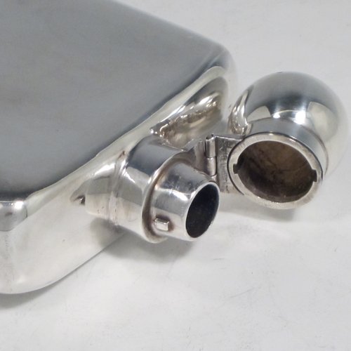 Antique Victorian sterling silver combination whisky hip flask with cigarette case, having a plain shaped rectangular body with rounded shoulders, a bayonet-fit lid, and a hinged side cover with clasp. Made by John Newton Mappin of London in 1893. The dimensions of this fine hand-made silver whisky flask are length 16.5 cms (6.5 inches), width 9 cms (3.5 inches), depth 2.5 cms (1 inch), and it weighs approx. 265g (8.5 troy ounces).