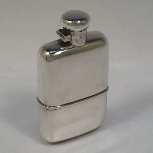 A very handsome Antique Edwardian Sterling Silver whisky hip flask, having a plain shaped rectangular body with rounded shoulders, a bayonet-fit lid, and a pull-off cup. Made by Marks and Cohen of Birmingham in 1905. The dimensions of this fine hand-made antique silver whisky flask are length 11.5 cms (4.5 inches), width 6 cms (2.3 inches), depth 2 cms (0.75 inch), and it weighs approx. 135g (4.4 troy ounces).
