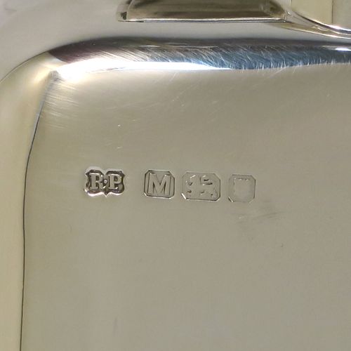 A heavy Sterling Silver whisky hip flask, having a plain shaped rectangular body with rounded shoulders, and a round hinged bayonet-fit lid. This elegant silver whisky flask was made by Robin Pringle of London in 1947. The dimensions of this fine hand-made silver hip whisky flask are length 15 cms (6 inches), width 8.5 cms (3.3 inches), depth 2.5 cms (1 inch), and it weighs approx. 250g (8 troy ounces).
