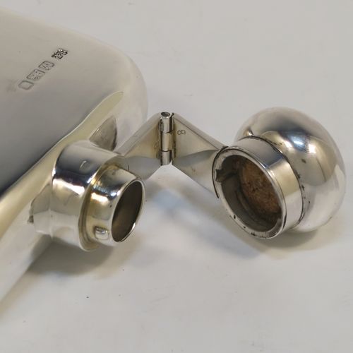 A heavy Sterling Silver whisky hip flask, having a plain shaped rectangular body with rounded shoulders, and a round hinged bayonet-fit lid. This elegant silver whisky flask was made by Robin Pringle of London in 1947. The dimensions of this fine hand-made silver hip whisky flask are length 15 cms (6 inches), width 8.5 cms (3.3 inches), depth 2.5 cms (1 inch), and it weighs approx. 250g (8 troy ounces).