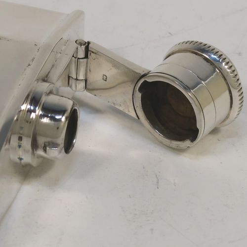 A very elegant Sterling Silver Art Deco style whisky flask, having a plain square panelled body, plain flat shoulders and sides, and a hinged and bayonet-fit lid with knurled top. This handsome silver flask was made by William Base and Sons of Birmingham in 1928. The dimensions of this fine hand-made silver whisky hip flask are height 7.5 cms (3 inches), width 7 cms (2.75 inches), depth 2 cms (0.75 inch), and it weighs approx. 70g (2.3 troy ounces).