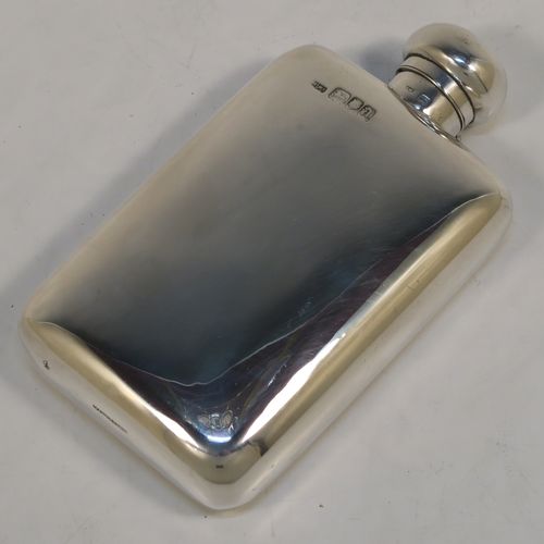A very handsome Antique Sterling Silver whisky hip flask, having a plain shaped rectangular body with rounded shoulders, and a round hinged bayonet-fit lid. This elegant antique silver whisky flask was made by Mappin and Webb of London in 1918. The dimensions of this fine hand-made antique silver hip whisky flask are length 13.5 cms (5.3 inches), width 7.5 cms (3 inches), depth 2.5 cms (1 inch), and it weighs approx. 124g (4 troy ounces).