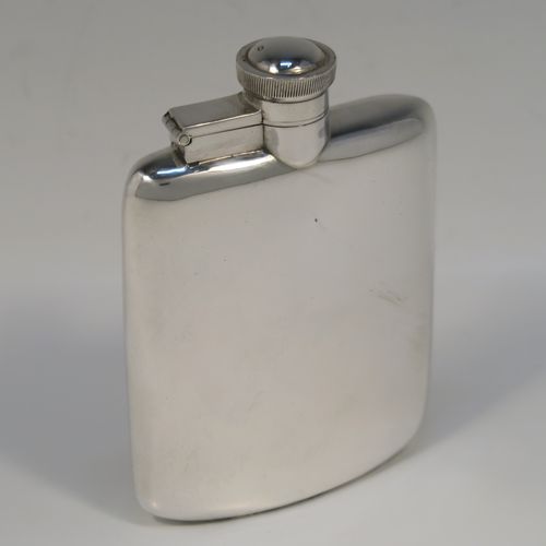 A handsome Sterling Silver whisky hip flask, having a plain shaped rectangular body with rounded shoulders, and a hinged bayonet-fit lid with knurled thumb-piece. This elegant silver whisky flask was made by James Dixon and Sons of Sheffield in 1944. The dimensions of this fine hand-made silver hip flask are length 12 cms (4.75 inches), width 8.5 cms (3.3 inches), depth 2 cms (0.75 inches) and it weighs approx. 139g (4.5 troy ounces).   