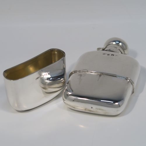 A small but very elegant Antique Sterling Silver whisky hip flask, having a plain shaped rectangular body with rounded shoulders, a bayonet-fit lid, and a pull-off cup. This handsome silver whisky flask was made by Marples and Beasley of Birmingham in 1916. The dimensions of this fine hand-made antique silver whisky hip-flask are length 10 cms (4 inches), width 6 cms (2.3 inches), depth 2 cms (0.75 inch), and it weighs approx. 114g (3.7 troy ounces).