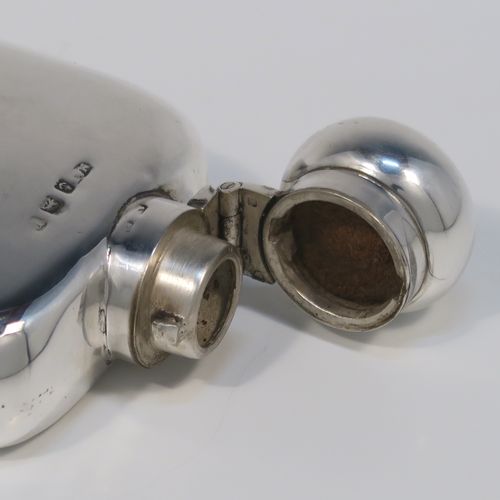 A small but very elegant Antique Sterling Silver whisky hip flask, having a plain shaped rectangular body with rounded shoulders, a bayonet-fit lid, and a pull-off cup. This handsome silver whisky flask was made by Marples and Beasley of Birmingham in 1916. The dimensions of this fine hand-made antique silver whisky hip-flask are length 10 cms (4 inches), width 6 cms (2.3 inches), depth 2 cms (0.75 inch), and it weighs approx. 114g (3.7 troy ounces).
