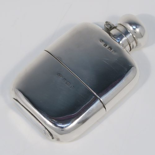 A small but very elegant Antique Sterling Silver whisky hip flask, having a plain shaped rectangular body with rounded shoulders, a bayonet-fit lid, and a pull-off cup. This handsome silver whisky flask was made by Marples and Beasley of Birmingham in 1916. The dimensions of this fine hand-made antique silver whisky hip-flask are length 10 cms (4 inches), width 6 cms (2.3 inches), depth 2 cms (0.75 inch), and it weighs approx. 114g (3.7 troy ounces).