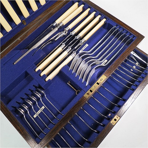 A Sterling Silver Old English pattern flatware / cutlery service for six people in original oak canteen, having 50 pieces total including 6 table forks, 6 dessert forks, 4 table spoons, 6 soup spoons, 6 dessert spoons, 6 tea or coffee spoons, 6 bone-handled table knives, 6 bone-handled dessert knives, a pair of sugar nips, and a 3-piece bone-handled carving set. All made by Thomas Turner and Co., of  Sheffield in 1931. The dimensions of this fine hand-made silver cutlery service are length of table fork 20.5 cms (8 inches), length of largest spoon 21.5 cms (8.5 inches), and the total weight is 1,828g (59 troy ounces).