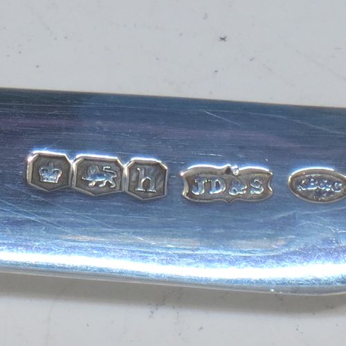 A very elegant Antique Sterling Silver and mother-of-pearl handled fruit set for twelve people. Having plain straight-sided pointed-end blade knives, and three-prong forks. All fitted into an original presentation box with cream satin and dark blue velvet interior. Made by James Dixon and Sons of Sheffield in 1925. The dimensions of this fine hand-made antique silver fruit service are length of knife 19 cms (7.5 inches), and the length of the fork 13.5 cms (5.25 inches).