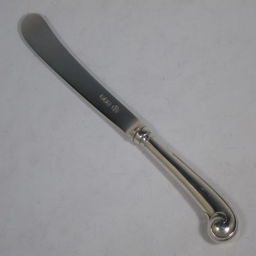 A very handsome Antique Sterling Silver fruit set for six people, in the early Hanoverian pattern, with three-prong forks and pistol-handled kives with spatular blades, all fitted into an original wooden presentation box with dark blue satin and velvet-lined interior. Made by West and Sons of London in 1916. The dimensions of this fine hand-made silver fruit service are length of knife 20.5 cms (8 inches), and the length of the fork 16.5 cms (6.5 inches).