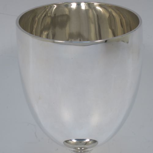 A pretty Antique Victorian Sterling Silver goblet, having a plain round tapering body, and sitting on a pedestal foot with an applied bead-edged border. Made by Edward Hutton of London in 1881. The dimensions of this fine hand-made antique silver goblet are height 16 cms (6.3 inches), diameter at lip 8.5 cms (3.3 inches), and it weighs approx. 212g (6.8 troy ounces).  