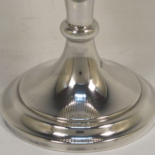 A very elegant Sterling Silver goblet, having a round tapering body with hand-chased half-fluted decoration, and sitting on a stepped pedestal foot. This handsome silver goblet was made by James and Walter Deakin of Sheffield in 1927. The dimensions of this fine hand-made silver goblet are height 15 cms (6 inches), diameter at lip 8 cms (3 inches), and it weighs approx. 113g (3.6 troy ounces).   