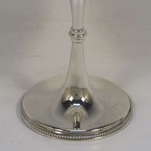 A very handsome Antique Sterling Silver large goblet, having a plain round tapering body, and sitting on a plain pedestal foot with an applied bead border. This beautiful antique silver goblet was made by Jackson and Fullerton of London in 1913. The dimensions of this fine hand-made antique silver goblet are height 18.5 cms (7.3 inches), diameter at lip 8 cms (3.25 inches), and it weighs approx. 189g (6 troy ounces).