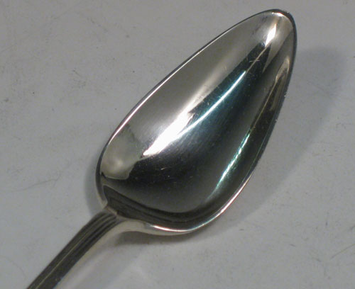 Sterling Silver Art Deco set of six grape-fruit spoons, having plain pointed oval bowls, and reeded Art Deco pattern handles, all in original satin and velvet-lined presentation box. Made by George Heath of Sheffield in 1934. The dimensions of these fine hand-made grapefruit spoons are length 14 cms (5.5 inches), and they weigh a total of 151g (4.9 troy ounces).