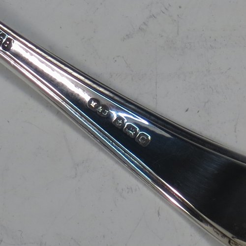 A Sterling Silver Art Deco set of six grape-fruit spoons and a sugar ladle, having panelled pointed oval bowls, and reeded Art Deco Belmont pattern handles, all in original white satin and black velvet-lined presentation box. Made by Marson & Jones of Birmingham in 1931. The dimensions of these fine hand-made grapefruit spoons are length 15 cms (6 inches), and they weigh a total of 248g (8 troy ounces).    