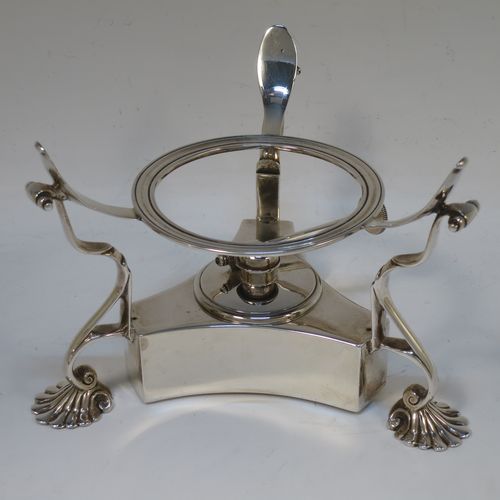 A very handsome Antique Victorian Sterling Silver tea kettle on a burner stand, having a plain round bellied body with an applied gadroon border, a lift-off lid with wooden finial, a leather covered hinged handle, and sitting on an original burner stand with removable central wick and three cast shell feet. Made by Joshua Vander of London in 1893. The dimensions of this fine hand-made antique silver kettle are length 21 cms (8.25 inches), height 27.5 cms (10.75 inches), width 18 cms (7 inches), and the total weight is approx. 770g (24.8 troy ounces).
