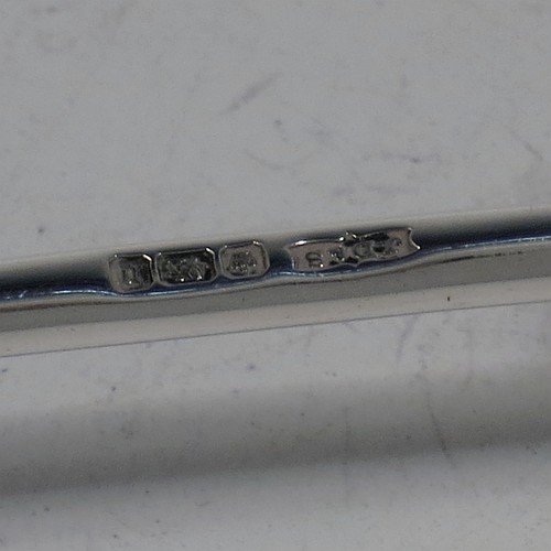 A very pretty Antique Sterling Silver pair of knife rests, with hand-pierced and scroll style rest ends, and plain round central struts. Made by James Dixon Sheffield in 1913. The dimensions of this fine hand-made pair of antique silver knife rests are length 7 cms (2.75 inches), height 4 cms (1.5 inches), and they weigh a total of approx. 47g (1.5 troy ounces).