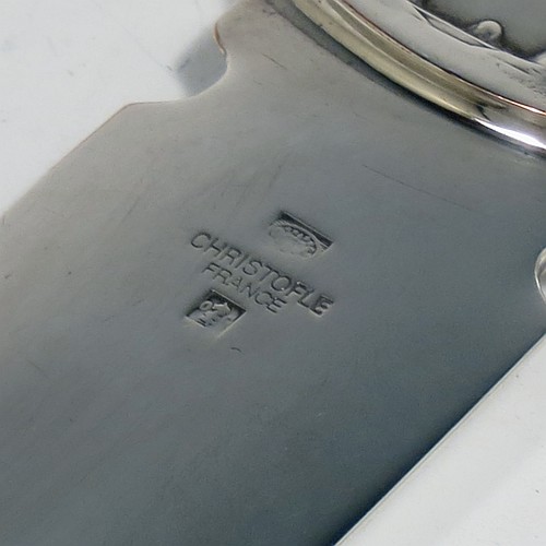 A very stylish Silver-Plated letter or envelope opener, having a very plain straight-sided blade with tapering point, attached to a heavy round handle with one side having a hand-chased schooner ship, and the reverse with a view of the Kuwaiti water towers. Made by Christofle of Paris, France, in circa. 1980. The dimensions of this fine hand-made silver plated envelope or letter opener are length 22 cms (8.6 inches), and diameter of handle 5 cms (2 inches).