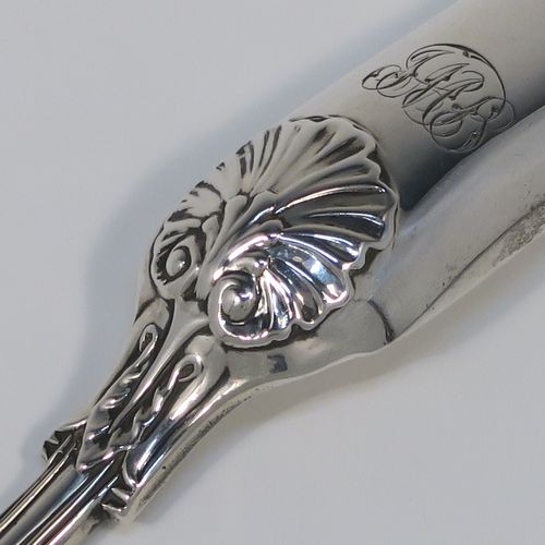 A very handsome Antique Georgian George III Sterling Silver marrow scoop, having a hand-chased shell back above heel on reverse. This elegant silver marrow scoop was made by William Bateman of London in 1825. The dimensions of this fine hand-made antique silver marrow scoop are length 22 cms (8.75 inches), and it weighs approx. 50g (1.6 troy ounces). Please note that this item is monogrammed.   