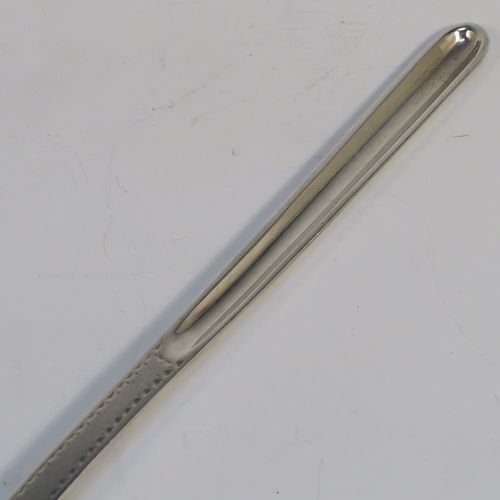 A very elegant Antique Georgian George III Sterling Silver marrow scoop with bright-cut hand-engraved decoration. This handsome antique silver marrow scoop was made by Benjamin Mountigue of London in 1783. The dimensions of this fine hand-made antique silver marrow scoop are length 22 cms (8.5 inches), and it weighs approx. 49g (1.6 troy ounces).

  