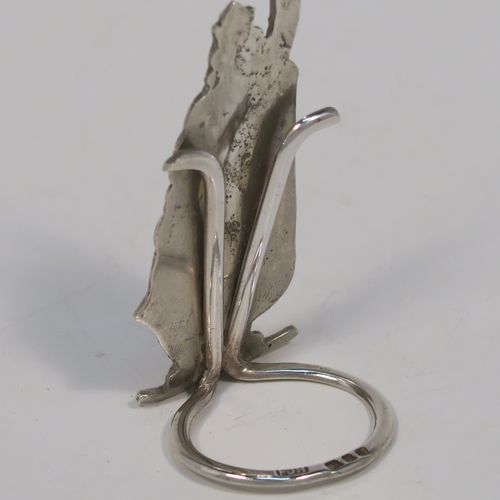 A handsome and rare pair of King Arthur Sterling Silver place card holders, having cast figural bodies, and sitting on circular wire-work bases. This elegant pair of silver menu or place card holders were made by F. J. Ross and Sons of London in 1937. The dimensions of this fine pair of silver King Arthur figural place card holders are height 7.5 cms (3 inches), diameter of ring bases 2.5 cms (1 inch), and they weigh a total of approx. 49g (1.6 troy ounces).