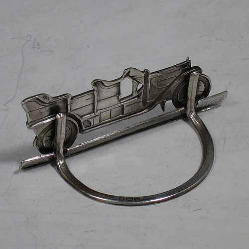A very rare Antique Edwardian Sterling Silver set of twelve place card or menu card holders, having bodies in the shape of vintage motor cars, each mounted on a base with a semi-circular wire foot and slots for menus or place-cards. Made in Birmingham in 1907. The dimensions of this fine set of antique silver menu or place card holders are length 6.5 cms (2.5 inches), height 3 cms (1.2 inches), depth 3cms (1.2 inches), and they weigh a total of approx. 221g (7 troy ounces).