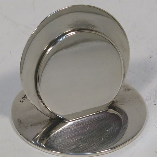 A very handsome and heavy Antique Sterling Silver set of four place card holders, having very plain round bodies, and all in their original white satin and dark-blue velvet-lined presentation box. These beautiful silver place card holders were made by Sampson and Morden of Chester in 1922. The dimensions of this fine hand-made set of antique silver place card holders are diameter of bases 4 cms (1.5 inches), height 4 cms (1.5 inches), and they weigh a total of approx. 149g (4.8 troy ounces).