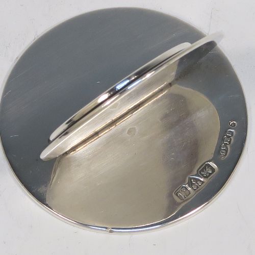 A very handsome and heavy Antique Sterling Silver set of four place card holders, having very plain round bodies, and all in their original white satin and dark-blue velvet-lined presentation box. These beautiful silver place card holders were made by Sampson and Morden of Chester in 1922. The dimensions of this fine hand-made set of antique silver place card holders are diameter of bases 4 cms (1.5 inches), height 4 cms (1.5 inches), and they weigh a total of approx. 149g (4.8 troy ounces).