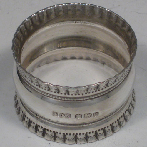 A very pretty Antique Sterling Silver set of twelve napkin, in their original satin and velvet-lined presentation box. These beautiful silver were made by James Dixon & Sons of Sheffield in 1920. The dimensions of each silver napkin ring: diameter 4 cms (1.5 inches), height 2.5 cms (1 inch). Weight approx. 12 troy ounces (372g).